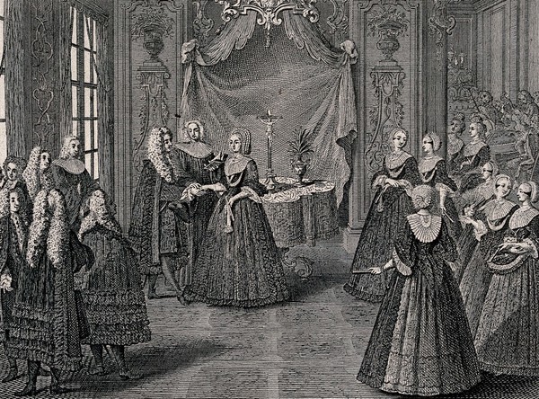 A man and a woman are being married by the priest with many guests in attendance. Engraving.