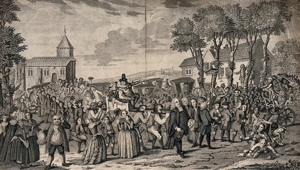 The Dunmow Flitch: a procession of people follow the winning couple who are being carried in a chair on the shoulders of four men while others walk in front carrying a piece of bacon on a stick. Engraving by C. Mosley after D. Ogborne, 1751.