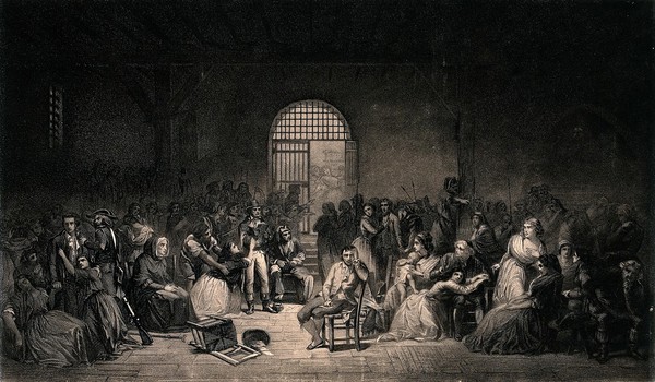 French Revolution: a prisoner sits in the middle of a crowded prison room as a woman nearby pleads with an official. Aquatint and etching by A. Riffaut after Ch. Muller.