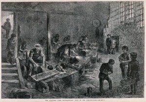 view Men and boys working in a fork-grinding factory in Sheffield. Wood engraving by M. Jackson after J. Palmer, 1866.