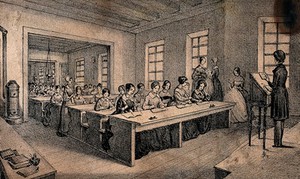 view A classroom with children sitting at long tables and a teacher standing with a book in her hand. Lithograph by J.B. Sonde.