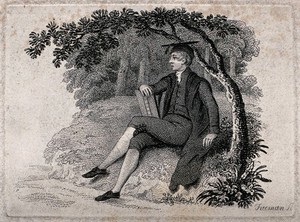 view A man wearing a gown and mortar board sits on a bank under a tree holding a book. Engraving by Freeman.