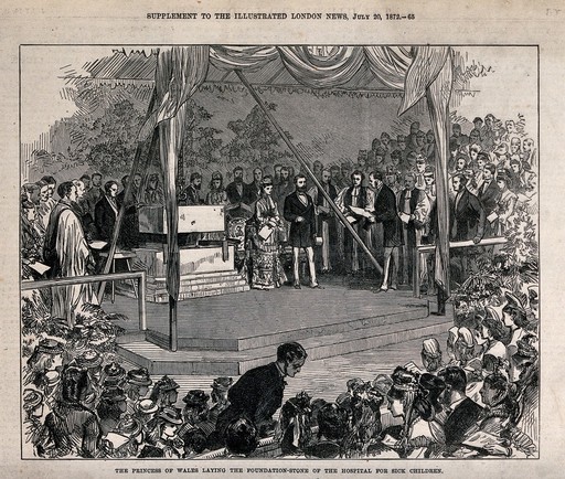 A couple stand on a platform where a large stone is suspended on a chain and a great crowd of people are watching the event. Wood engraving.