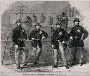 view Four firemen stand in front of their fire-engine. Wood engraving.