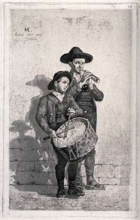 A man is playing a type of flute and a boy is playing a drum. Etching by J.J. Martínez Espinosa.