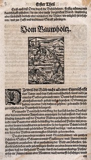 A group of wood cutters are working with axes and picks. Woodcut.