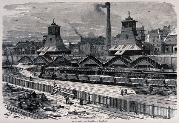 Coal and coke works at Le Creusot, Saône-et-Loire: a railway siding with coal drops, railway trucks carrying coal, and colliery buildings. Wood engraving by H. Linton after J. Férat.