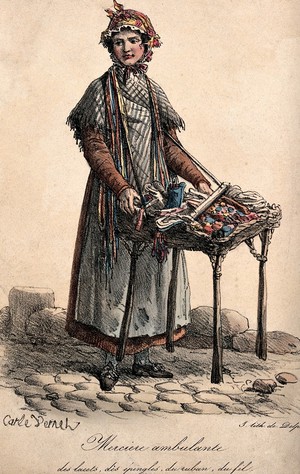 view A woman trading in haberdashery has set her stall up on the street. Coloured lithograph by Charles Vernet.