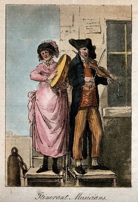 A man and a woman are standing on seats at the corner of a building, one is playing the tambourine and the other a violin. Coloured etching.