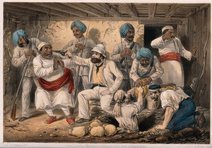 view A white man (magistrate or policeman?) holds a gun to the head of an Indian man as others retrieve bags of money buried in the ground. Coloured lithograph by E. Walker after G.F. Atkinson.