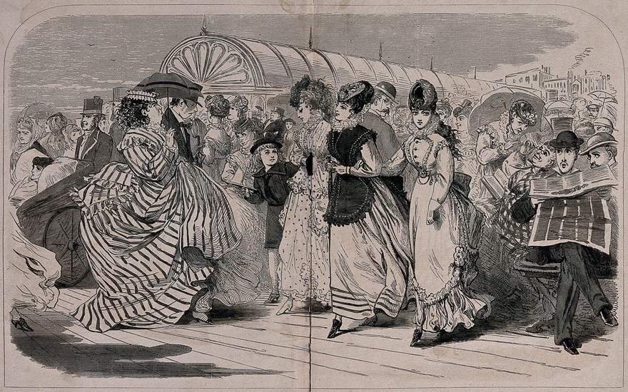 Crowds of people are out walking on Brighton pier: a woman is being pushed in a bath chair, a large lady is carrying a parasol, and three young women are being scrutinised by a variety of men. Wood engraving.