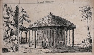 view Scenery to be used in a toy theatre: a large hut with a straw roof has a chair outside and a table with a water barrel on it. Lithograph.