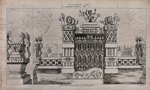 view Scenery to be used in a toy theatre: a large gateway between two decorated pillars surmounted by dragons set overlooking a town. Lithograph.