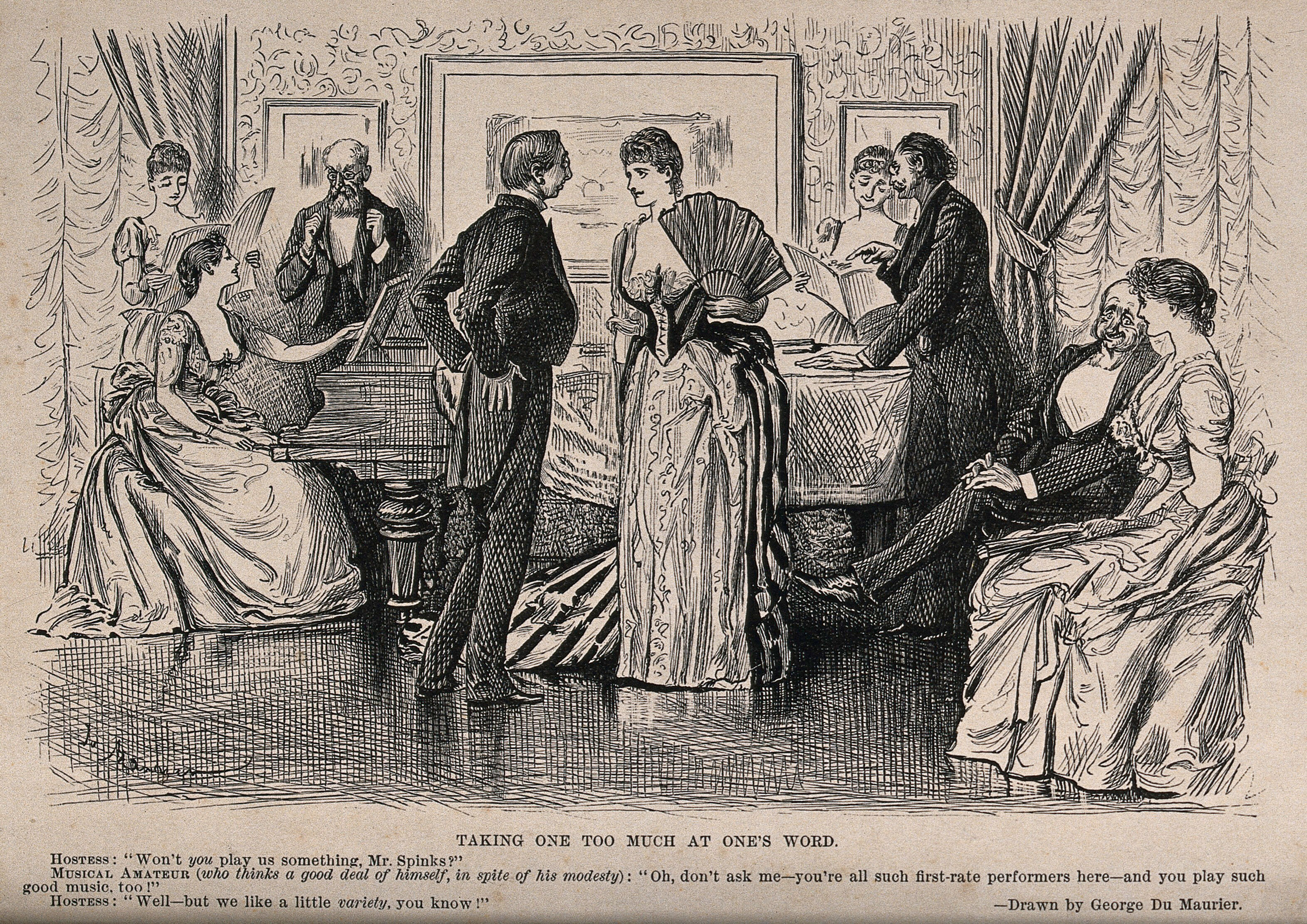 A man and woman stand talking together in the middle of ...