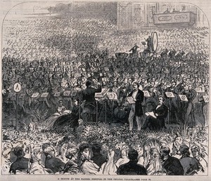 view Handel festival in the Crystal Palace, Sydenham, London: a large audience attending a concert. Wood engraving by J. Mahoney, 1865.