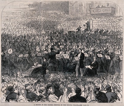 Handel festival in the Crystal Palace, Sydenham, London: a large audience attending a concert. Wood engraving by J. Mahoney, 1865.