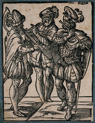 Three men playing wind instruments. Woodcut by Jost Amman, 1568.