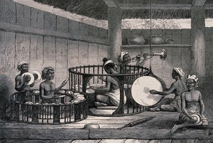 view An ensemble of Burmese musicians playing traditional instruments at a funeral. Wood engraving, 1872, after H.G. Robley.