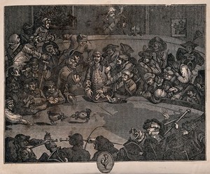 view Men are gathered around in a circle watching two cocks fight one another. Wood engraving after W. Hogarth.