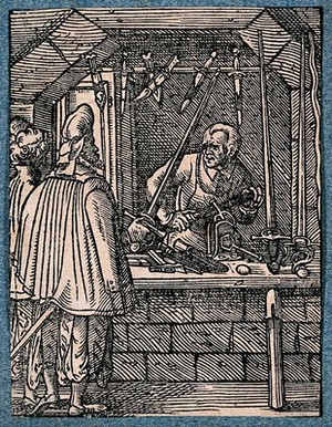 view A cutler, or maker of knives, daggers and swords, working in his shop as a customer tests the weight of a sword. Woodcut by J. Amman.