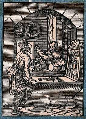 A wire-drawer working at his bench. Woodcut by J. Amman.