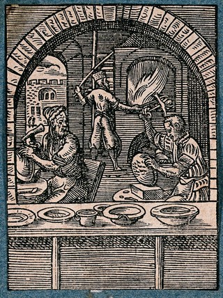 Makers of brass basins and bowls at work in their workshop. Woodcut by J. Amman.