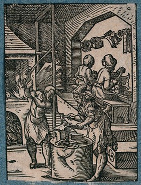 Locksmiths working in their workshop: keys, bolts and padlocks are hanging from a line. Woodcut by J. Amman.