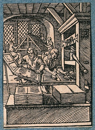 Printers working at a printing press, and setting type. Woodcut by J. Amman.