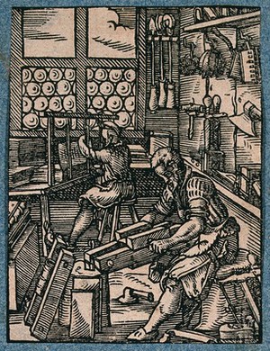 view Two bookbinders at work: one is sewing the quires of a volume with thread, while the other is tightening a volume in a nipping press. Woodcut by J. Amman.