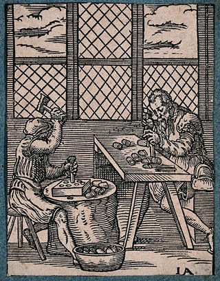Two craftsmen making thimbles. Woodcut by J. Amman.