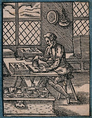 view A craftsman illuminating a document. Woodcut by J. Amman.