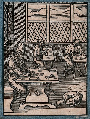 view Three craftsmen making clasps. Woodcut by J. Amman.