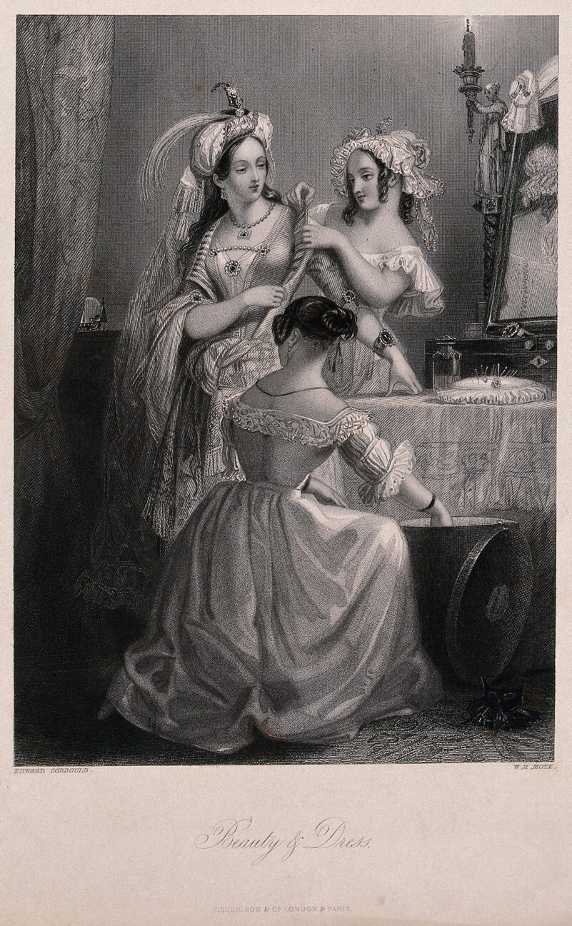 Three young women are dressing in ornate clothes in front of a dressing table. Engraving by W.H. Mote after Edward Corbould., [1846], by Edward Henry Corbould