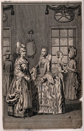 Women in fashionable dress talk to one another in an interior. Engraving.