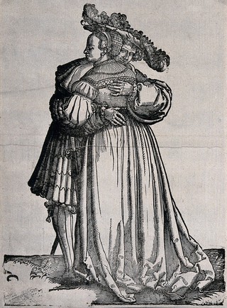 A couple in fashionable dress. Woodcut by Hans Schäufelein, 15--.