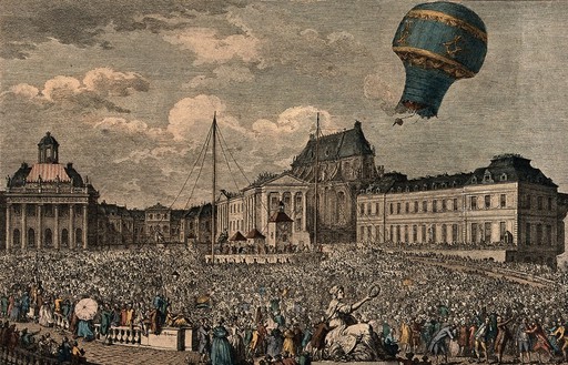 A huge crowd watches from the streets as a hot-air balloon takes off on a flight. Coloured etching.