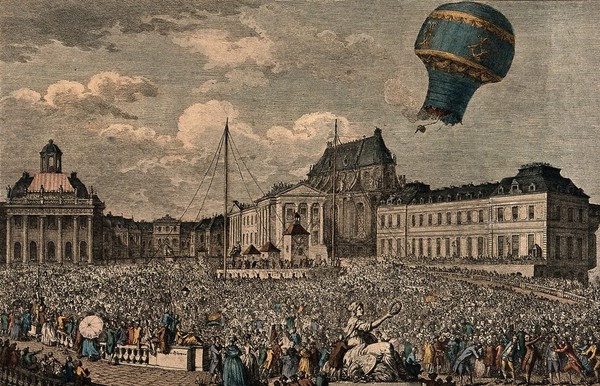 A balloon ascent by the Montgolfier brothers at Versailles in 1783 watched by a huge crowd. Coloured etching.