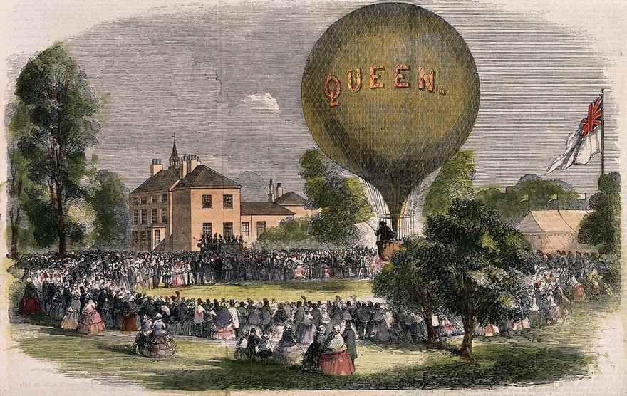 Crowds of people gathered at an entertainment at Basford, Staffordshire, including music and a balloon. Coloured wood engraving, 1859.