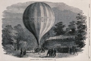 view The balloon "Royal Victoria" being launched at night by Charles Green at Vauxhall Gardens, London, watched by crowds of people. Wood engraving by Dalziel Brothers, 1878.