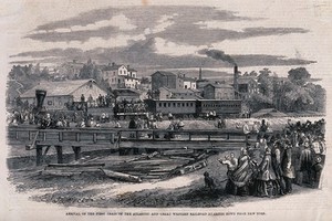 view Jamestown, New York: the first train arriving from New York City. Wood engraving, 1860.