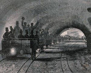 view A trial journey on the first part of the underground railway in London. Wood engraving, 1862.