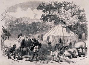 view A camp site for the railway engineer of the East Indian Railway Company with staff preparing food and tending animals. Wood engraving after E. Braddon, 1857.