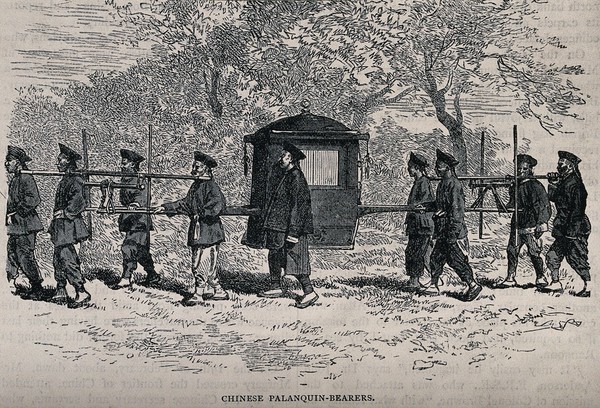 Bearers in China carrying a sedan chair suspended between poles. Wood engraving.