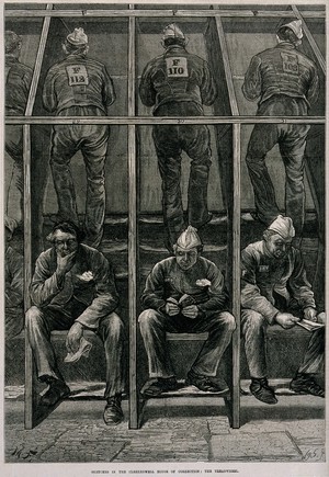 view Middlesex House of Correction: male prisoners treading on the boards of a treadmill: in the foreground others sit resting. Wood engraving by W.B. Gardner, 1874, after M. Fitzgerald.