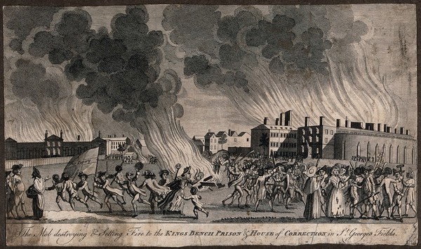 St George's Fields, Southwark: anti-Catholic rioters in the Gordon riots wielding sticks, displaying banners, and setting buildings on fire. Etching, 1780.