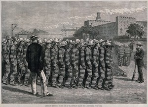 view Blackwell's Island Penitentiary, New York: prisoners in uniform are marching towards the penitentiary after hard labour outside, supervised by armed guards. Wood engraving after G.U. Régamey.