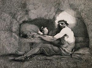 view A prisoner is sitting on straw in a cave with his feet chained to the wall, there are a few provisions on a small shelf in the rock. Etching by R. Blyth after J.H. Mortimer.