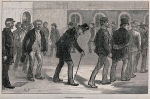 view Newgate Prison, London: male prisoners taking exercise by walking around the prison yard. Wood engraving after M. Fitzgerald, 1873.