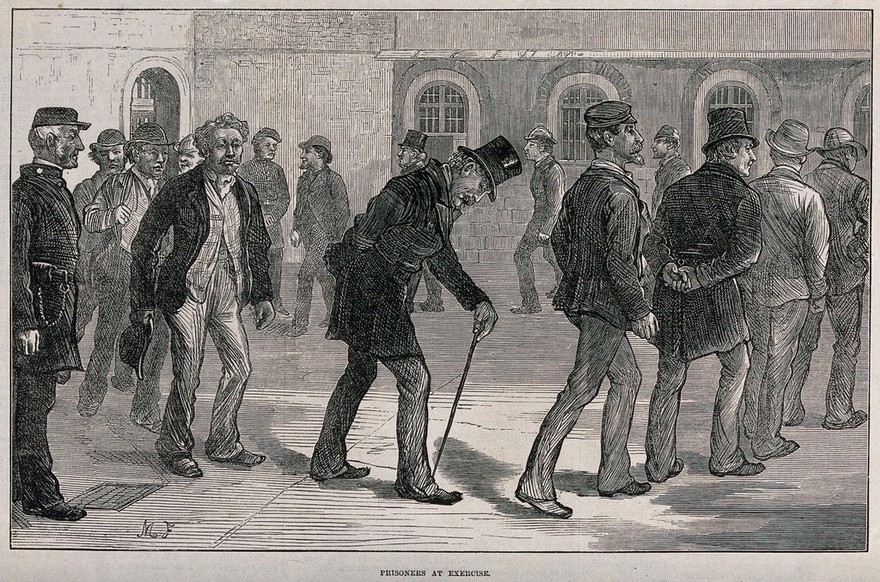 Newgate Prison, London: male prisoners taking exercise by walking around the prison yard. Wood engraving after M. Fitzgerald, 1873.