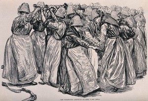 view Woking Convict Invalid Prison: women prisoners working the fire pump. Process print after Paul Renouard, 1889.